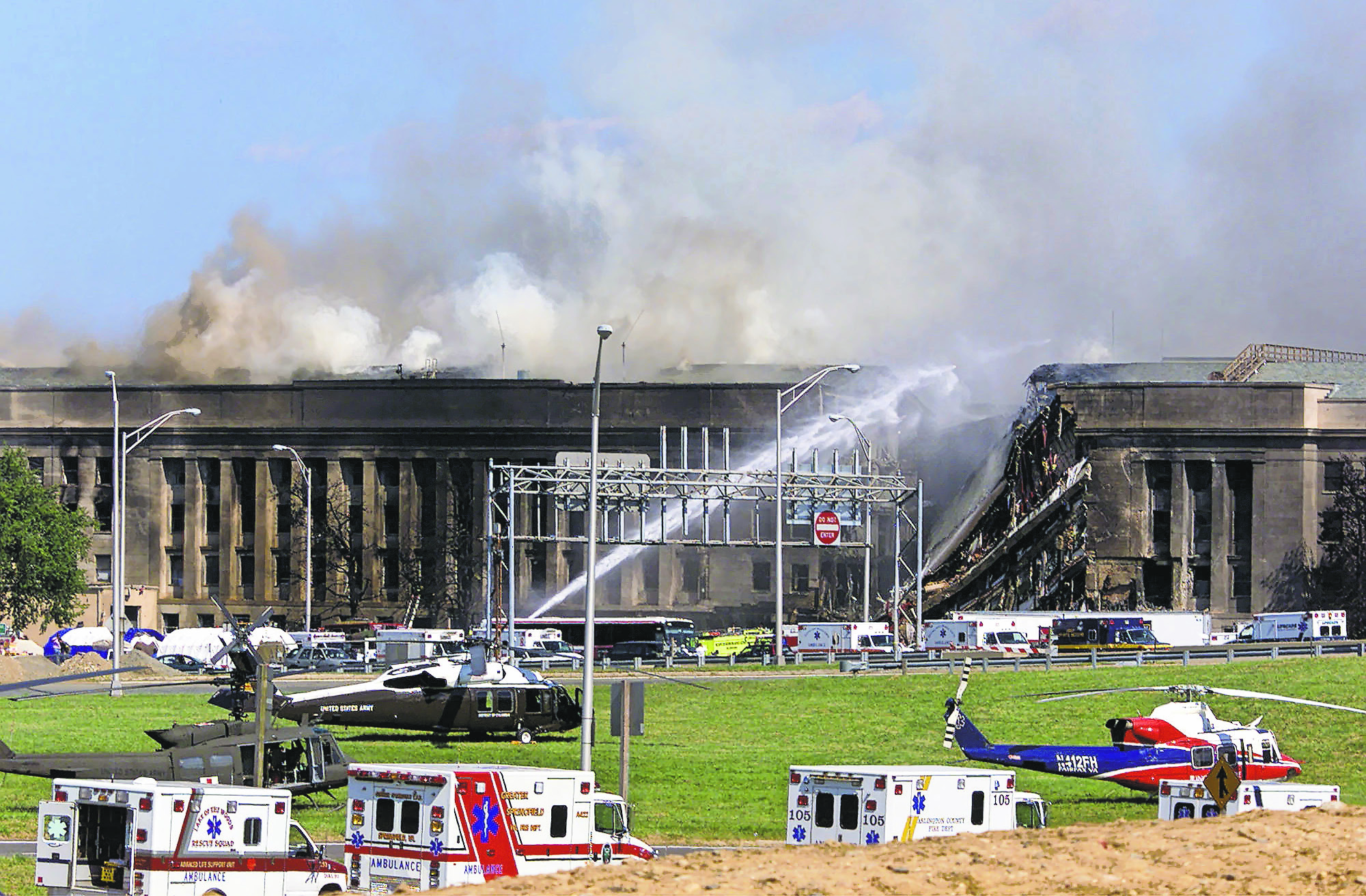 Chuck Kennedy / KRT / TNS Emergency vehicles and helicopters line the ...