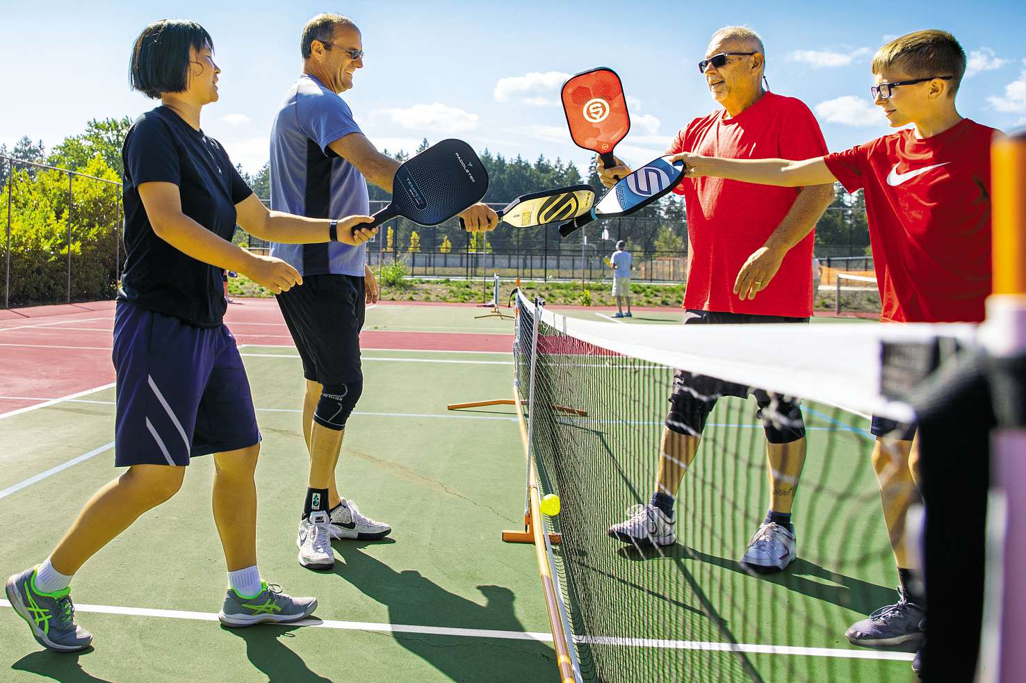 pickleball players from left cai haught bill schilling jon hussey and