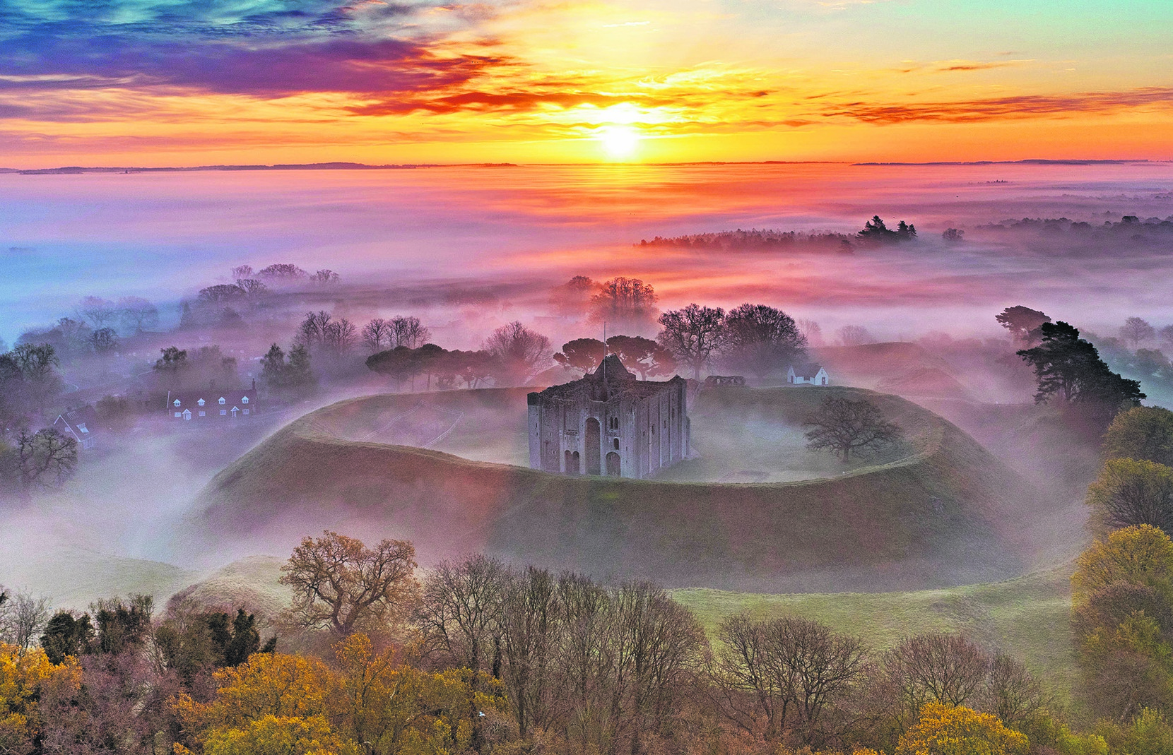 Castle Rising, part of the Sandringham estate, is described by English